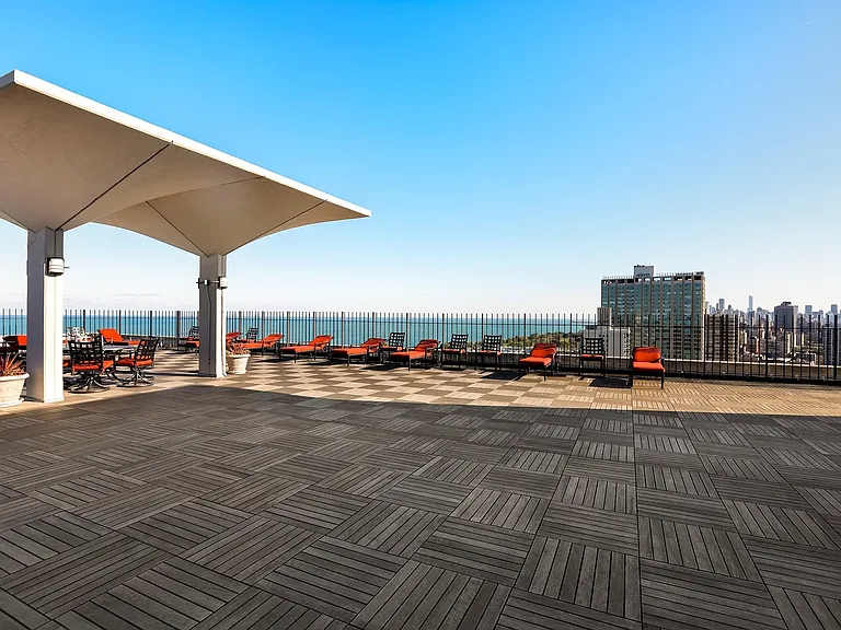 Rooftop deck with lounge chairs