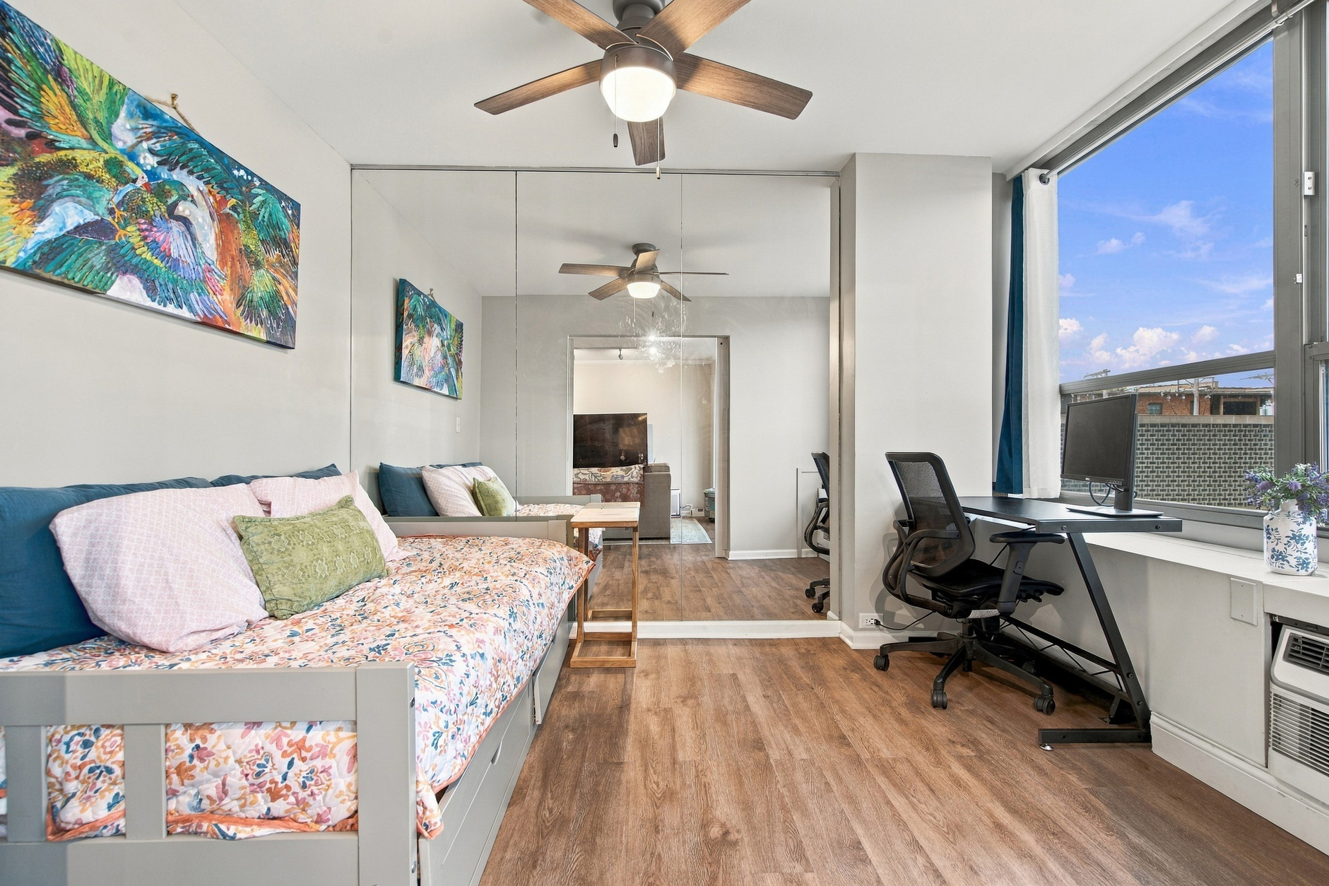 Bedroom with desk by the window